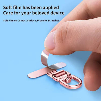 Rose gold car keychain with soft film application on a blue background