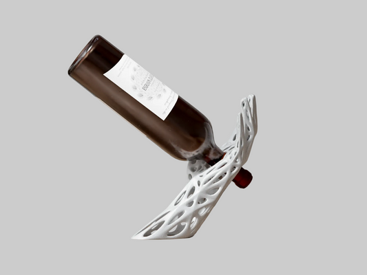 Bottle with a unique white holder on a gray background