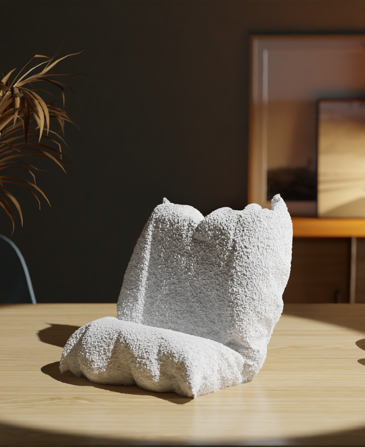 White textured chair on a wooden table with a blurred background